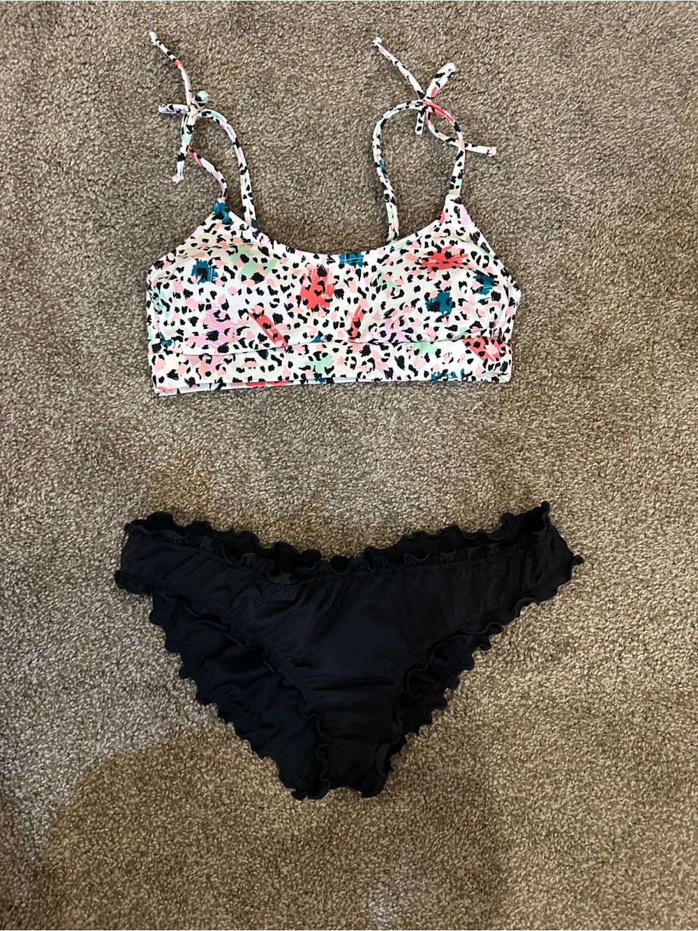 Two-Piece Bikini Set with Floral Speckle Top and Black Ruffle Bottom